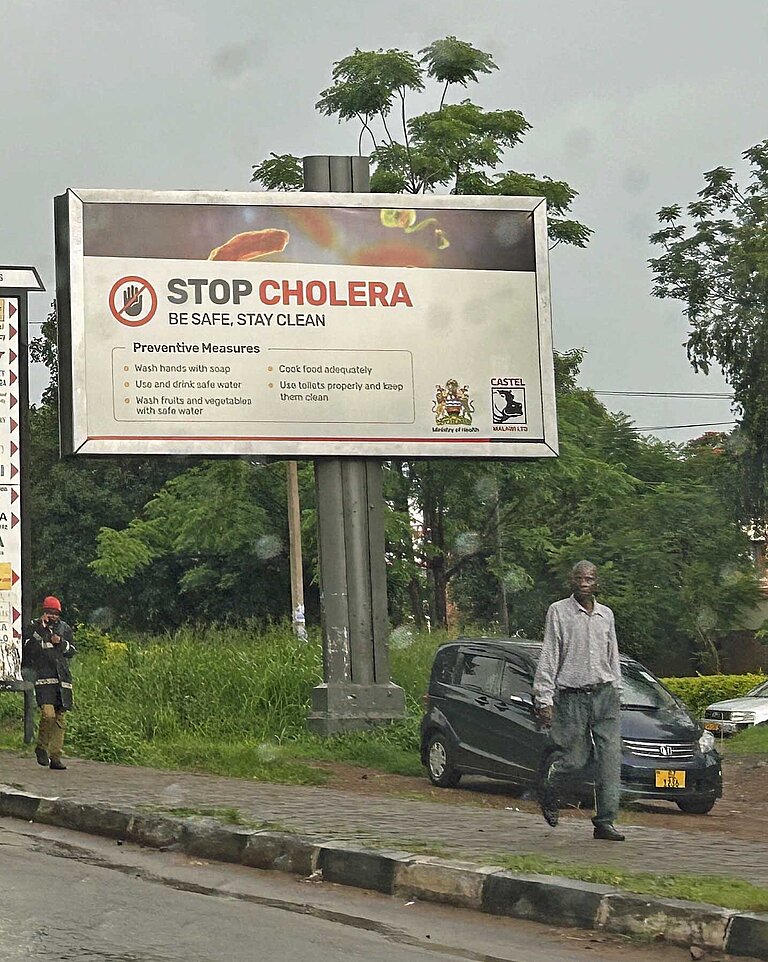 Ein Plakat warnt vor der Gefahr von Cholera