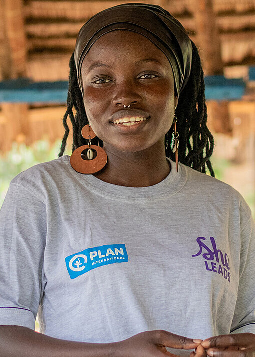 Faith als frühe Teilnehmerin des „She Leads“-Projekts