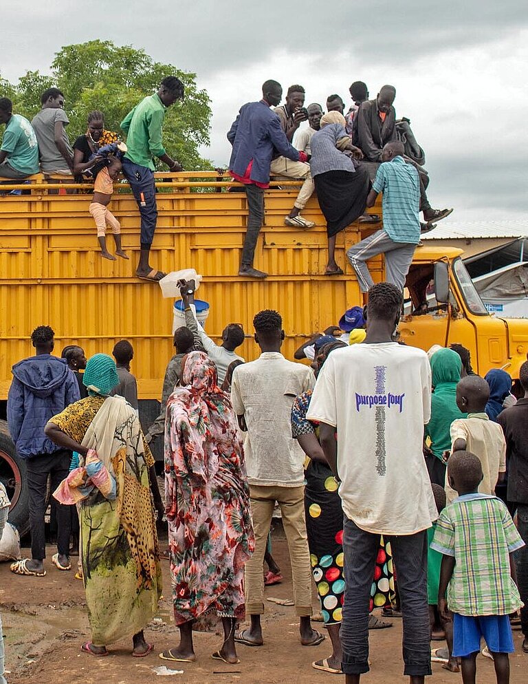 Ein Lastwagen voller Flüchtlinge