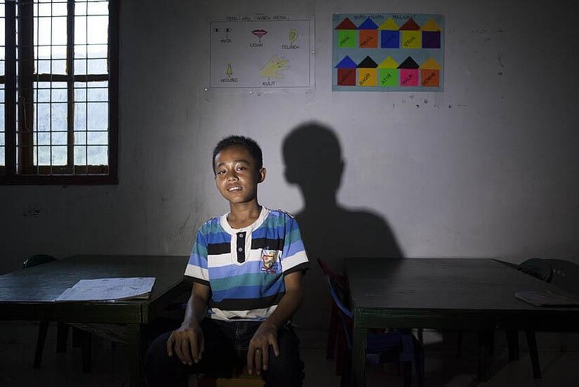 Ernanda, 13, lost his mother in the 2004 tsunami