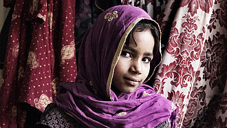 Adolescent girl at her home in Sixty-Six Quarters, Islamabad