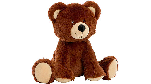 Plüschbär braun in seitlicher Annsicht.