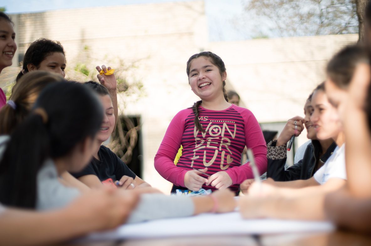 Girls from Paraguay took part in a three-day Leadership School, which aims to empower girls and equip them with the skills they need to be future leaders. The girls collectively named themselves the 'Steel Flowers', inspired by stories of women who fought for a more egalitarian world throughout history.
They also created a new flag, designed using symbols to represents girls, adolescents and young women breaking the chains of inequality. They also incorporated the symbol of feminism, as a sign of equality between girls and boys, and the national flower, Mburucuya, which represents the belief that women are fragile, however this flower is made of steel and symbolises the empowerment of girls.